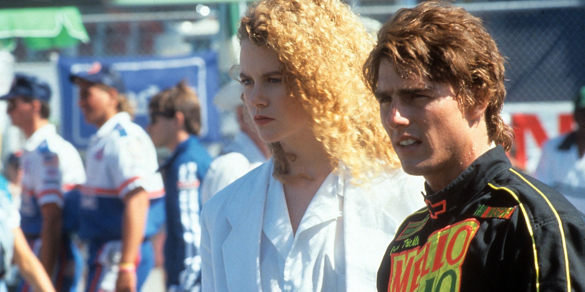 Tom Cruise in a NASCAR outfit next to Nicole Kidman in 'Days of Thunder' (1990)