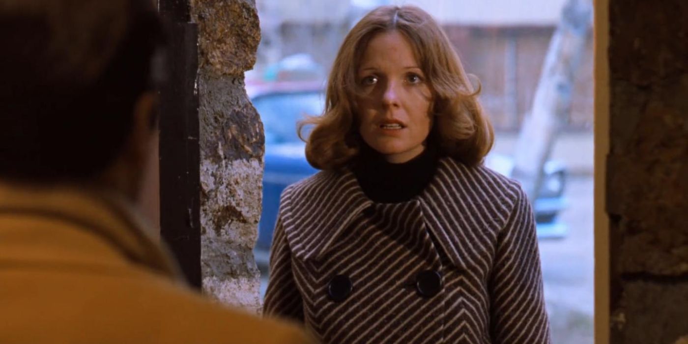 Diane Keaton as Kay Adams looking shocked while standing in front of someone in The Godfather Part II