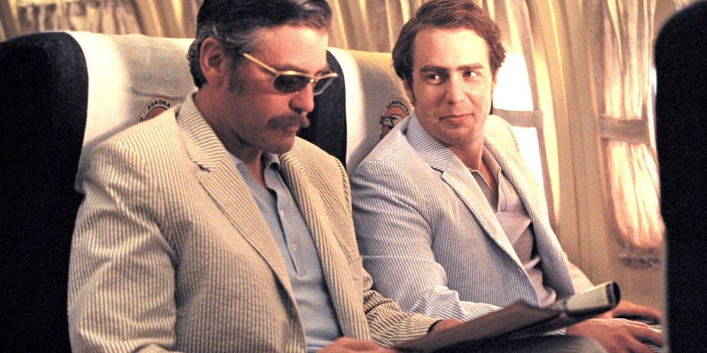 George Clooney and Sam Rockwell are on a plane in Confessions of a Dangerous Mind
