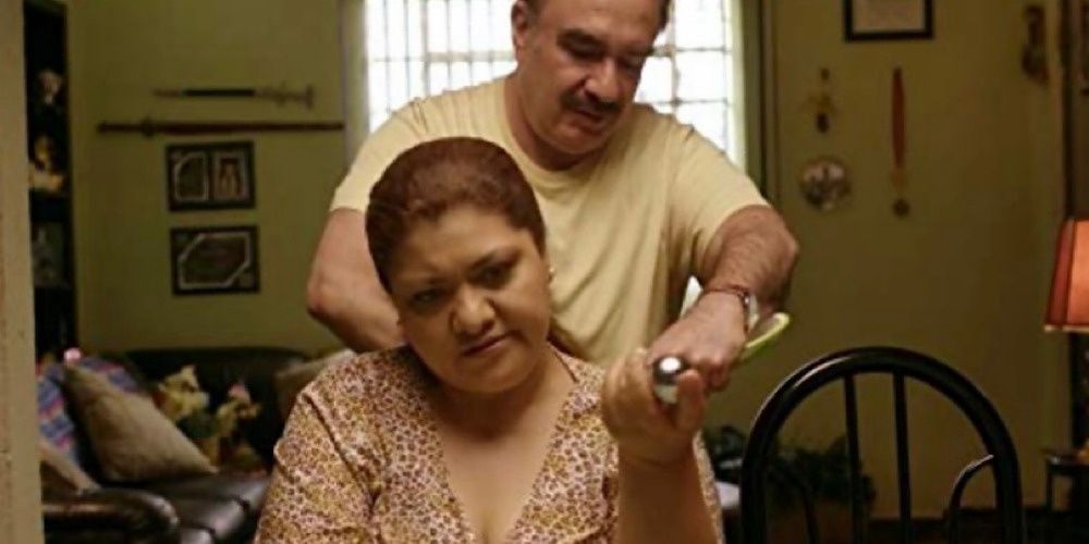 Married couple in the kitchen on Corazon Contento.