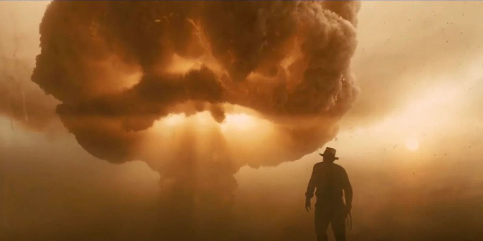 Indiana Jones in 'Kingdom of the Crystal Skull' standing in front of a nuclear explosion