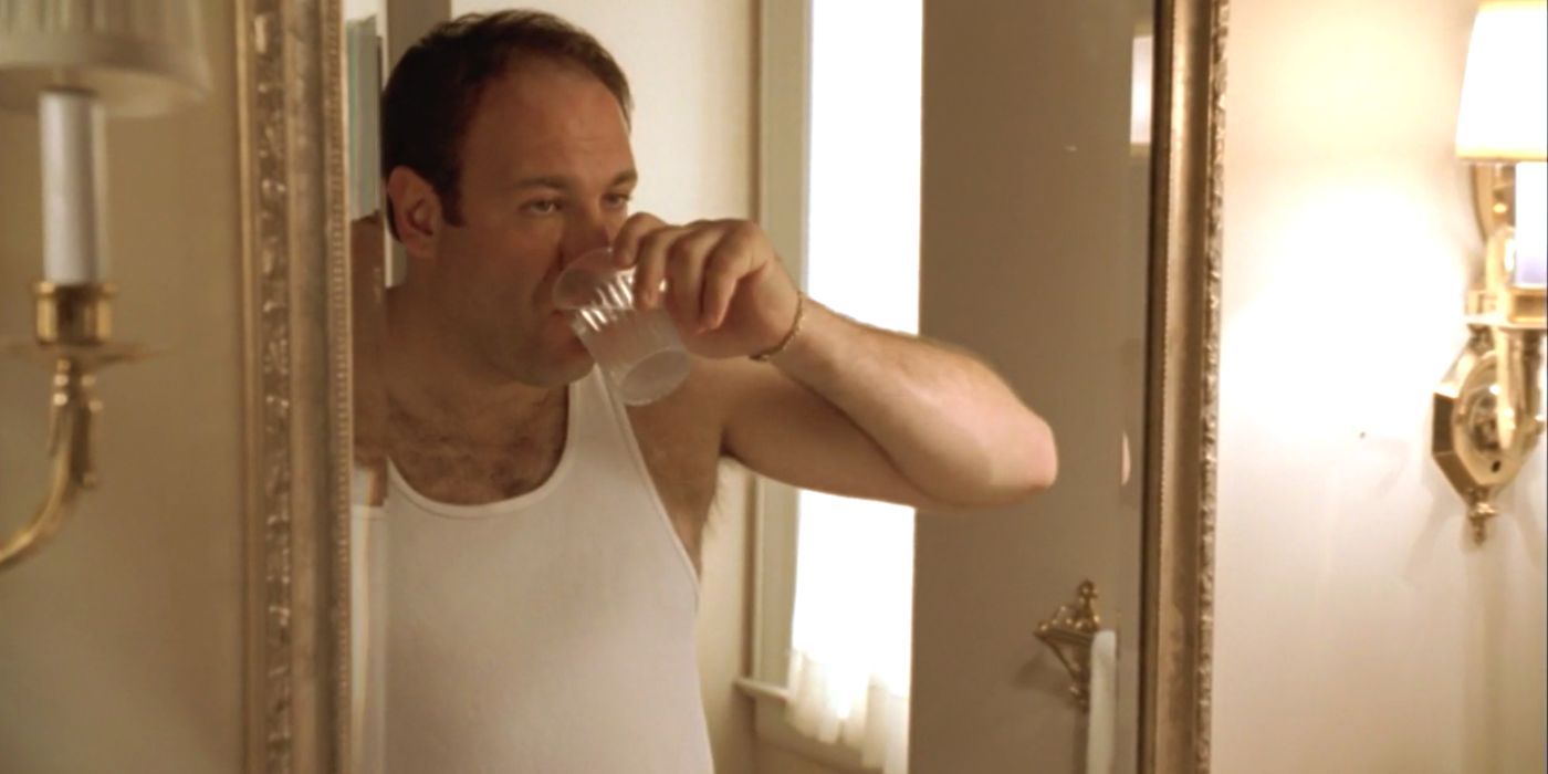 James Gandolfini as Tony Soprano standing in front of the bathroom mirror in 