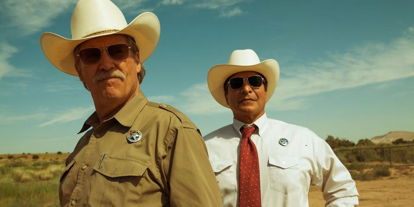 Marcus Hamilton and Alberto Parker looking at a person offscreen in 'Hell or High Water'