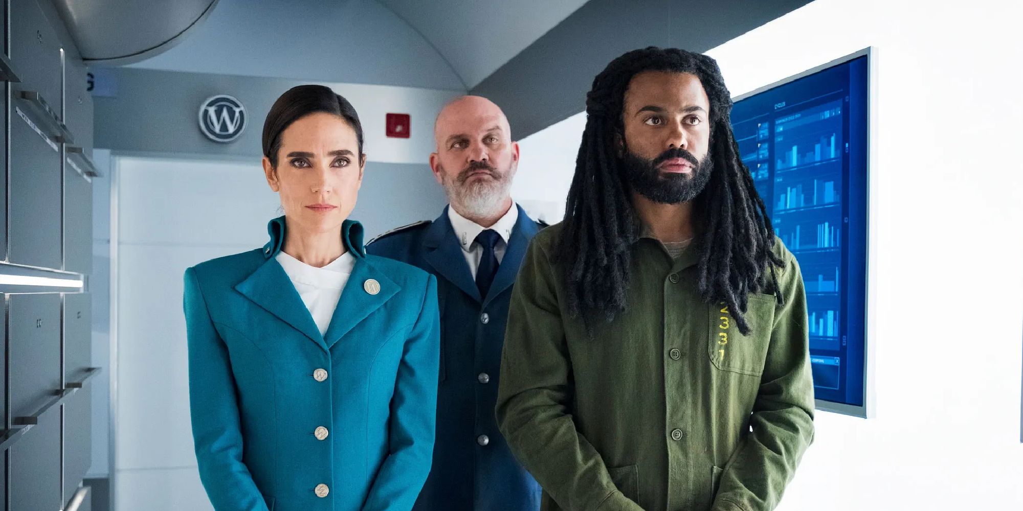 Jennifer Connelly, Mike O'Malley and Daveed Diggs standing together in Snowpiercer