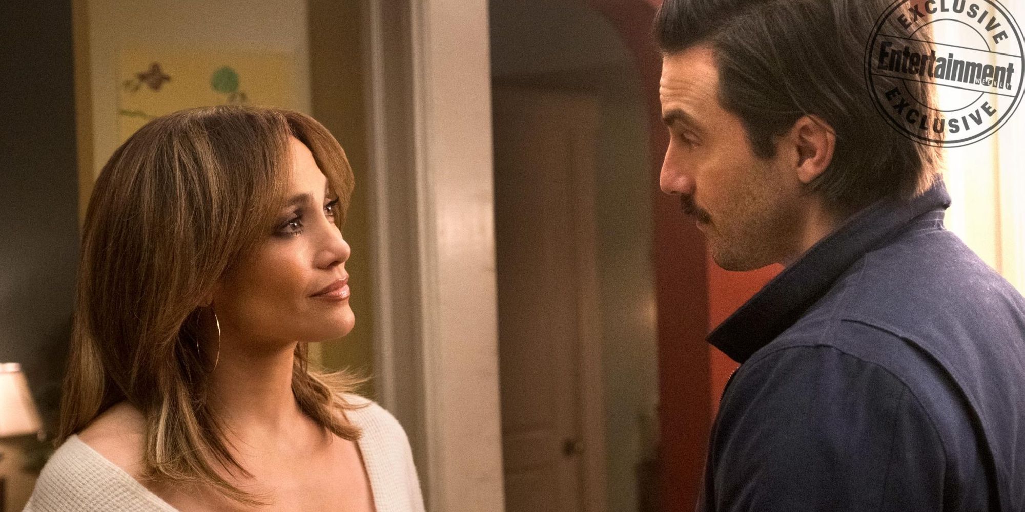 Jennifer Lopez and Milo Ventimiglia looking at each other in Second Act