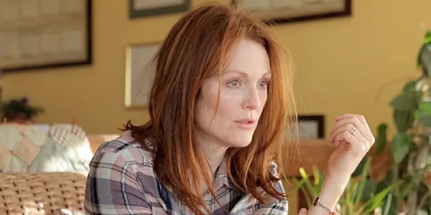 Julianne Moore staring at a distance with hand up in still image of 'Still Alice'