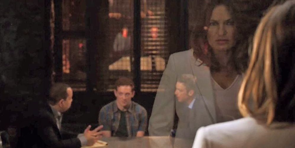 Olivia Benson (Mariska Hargitay) watches Riley Porter (Ethan Slater) get interrogated by the SVU team on 'Law & Order: SVU'