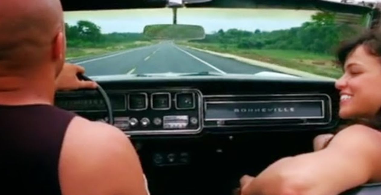 Vin Diesel and Michelle Rodriguez in a car in the short, Los Bandoleros. 