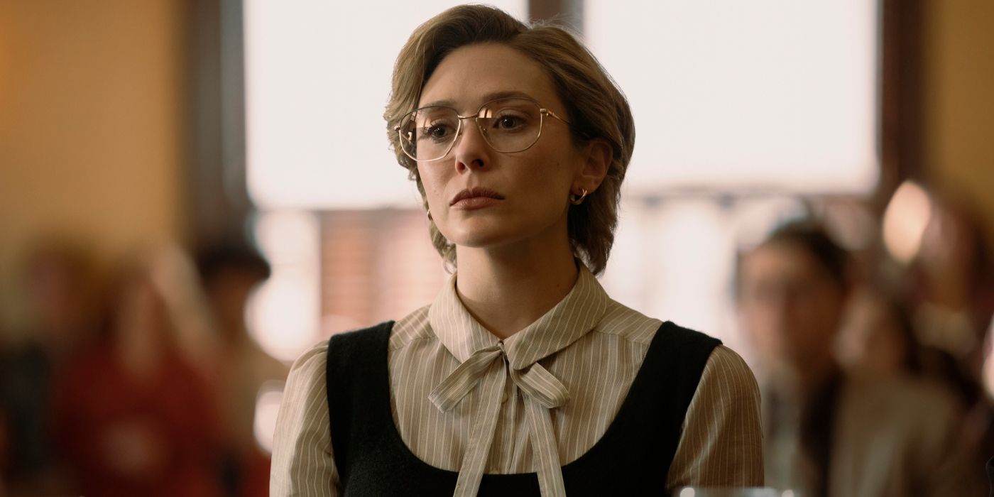 Elizabeth Olsen as Candy looking ahead in large glasses in Love and Death