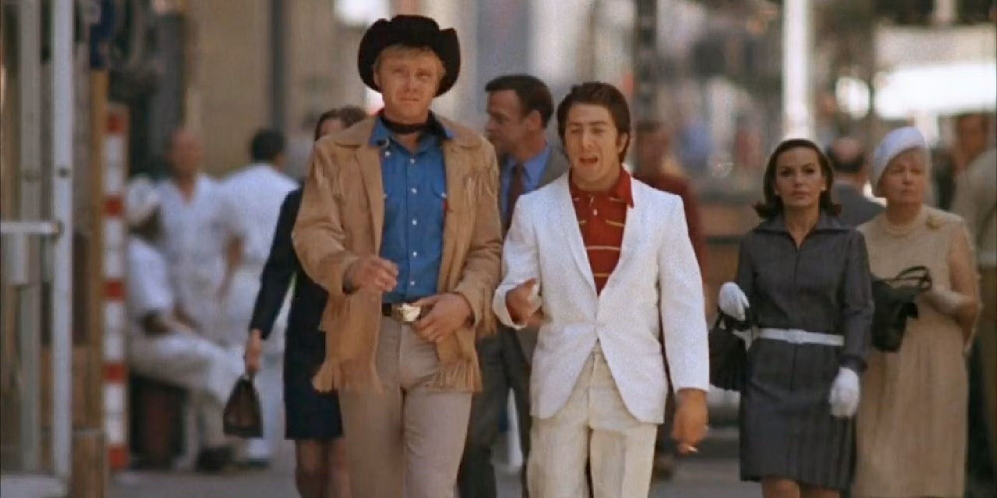 Joe and Rizzo walking down the street in Midnight-Cowboy---1969