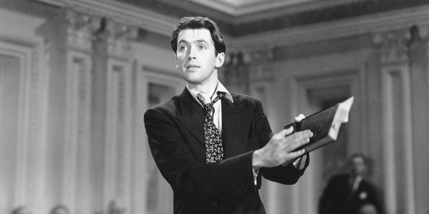 James Stewart holding up a book in Mr. Smith Goes to Washington.