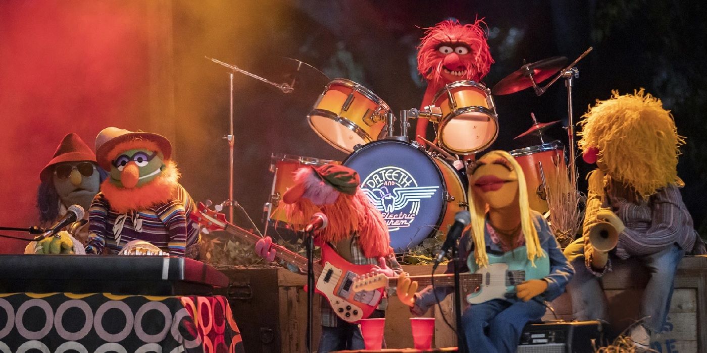 Dr. Teeth and the Electric Mayhem chilling out on stage in a scene from 'The Muppets Mayhem'