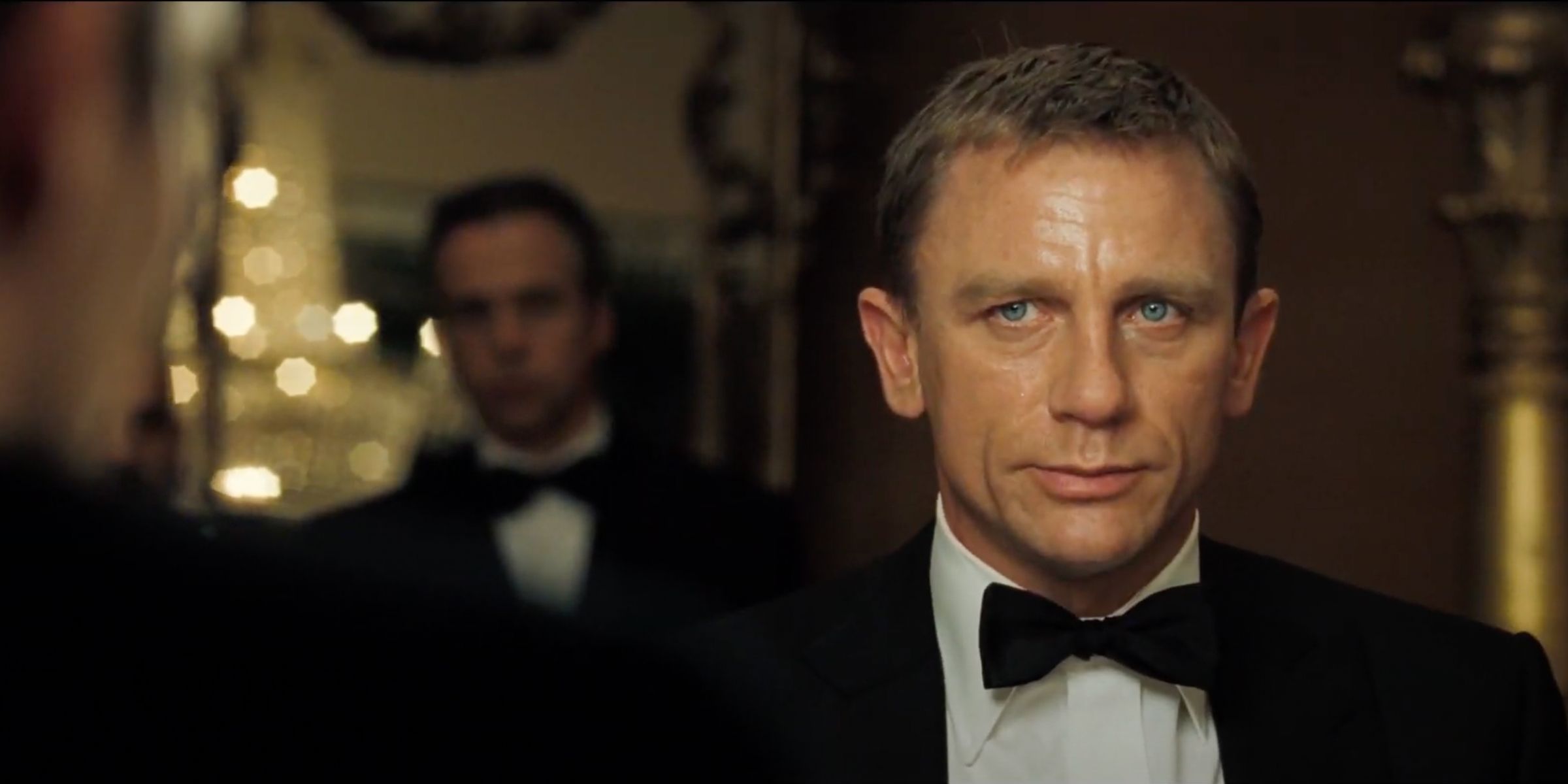 James Bond (Daniel Craig) confronts Le Chiffre at the poker table in 'Casino Royale'.