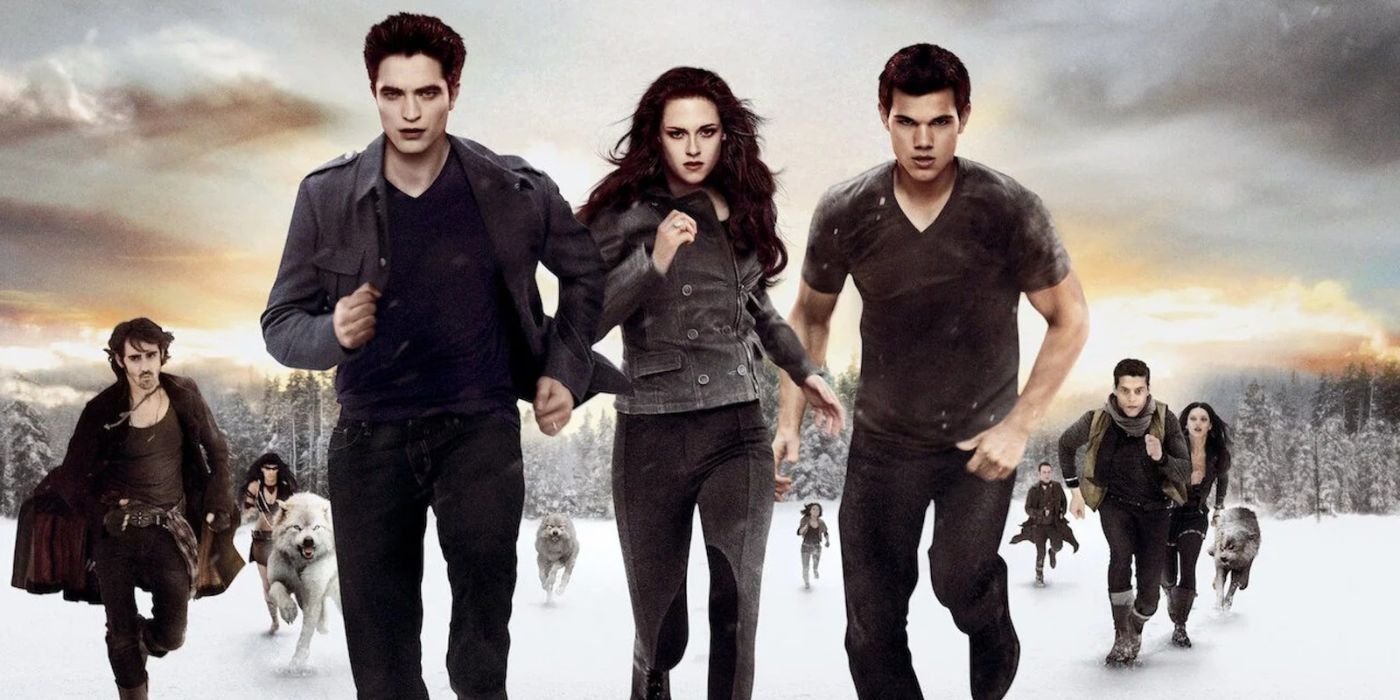 Robert Pattinson, Kristen Stewart, and Taylor-Lautner in a still from The Twilight Saga: Breaking Dawn Part 2