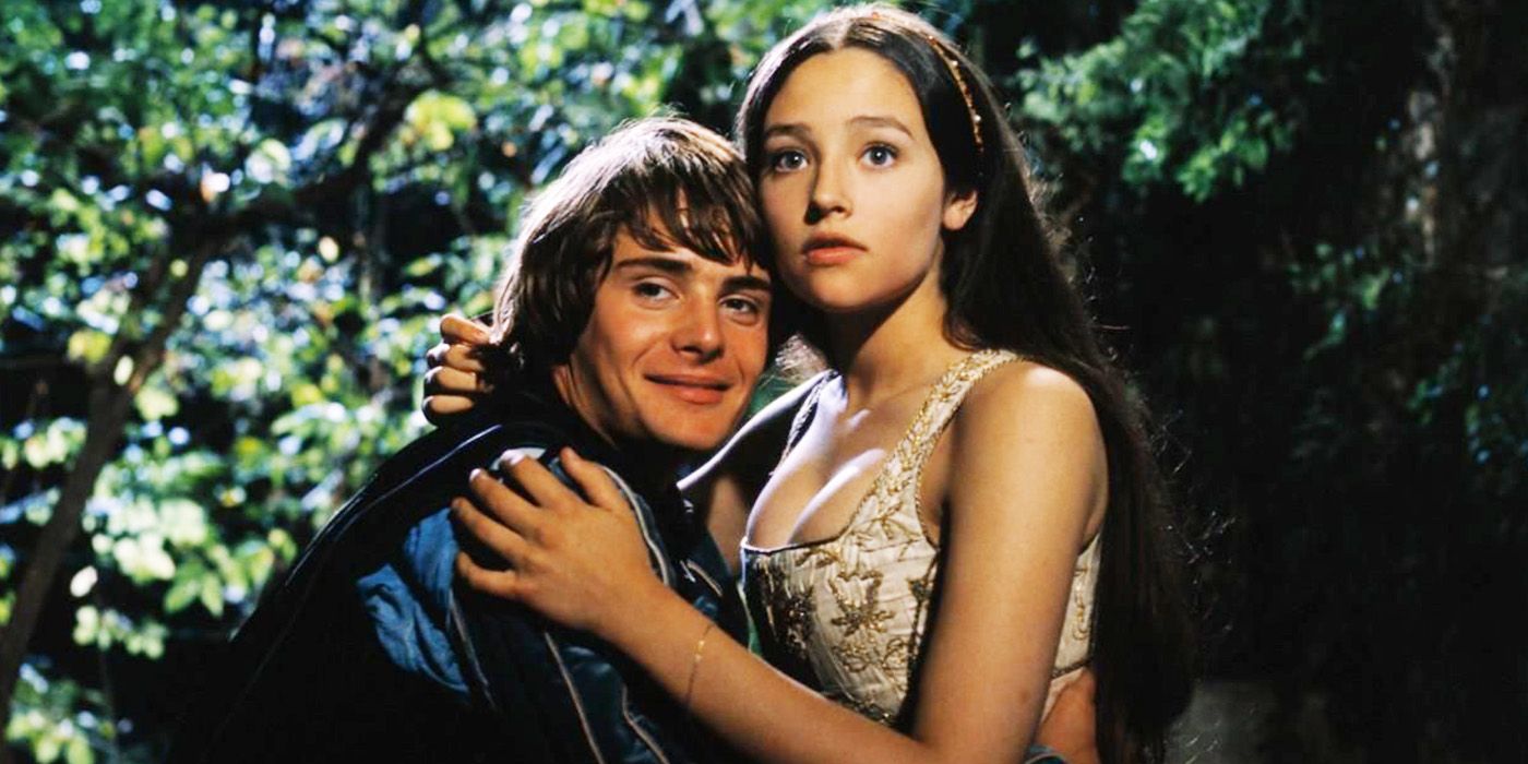Leonard Whiting and Olivia Hussey in Romeo and Juliet holding each other.