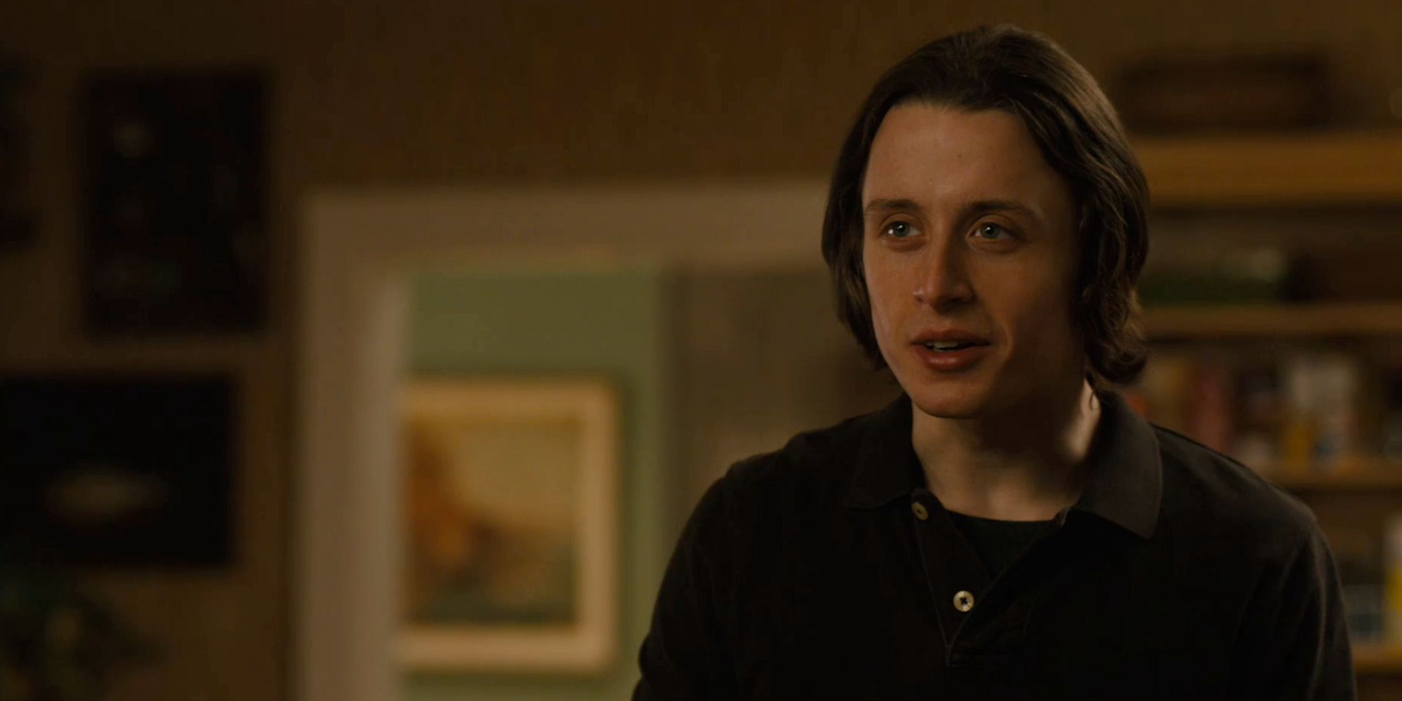 Rory Culkin in 'Gabriel', smiling in a dark house