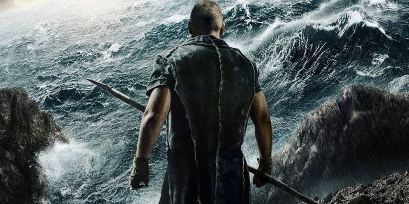 Russell Crowe as Noah holding a spear and facing a stormy sea in Noah