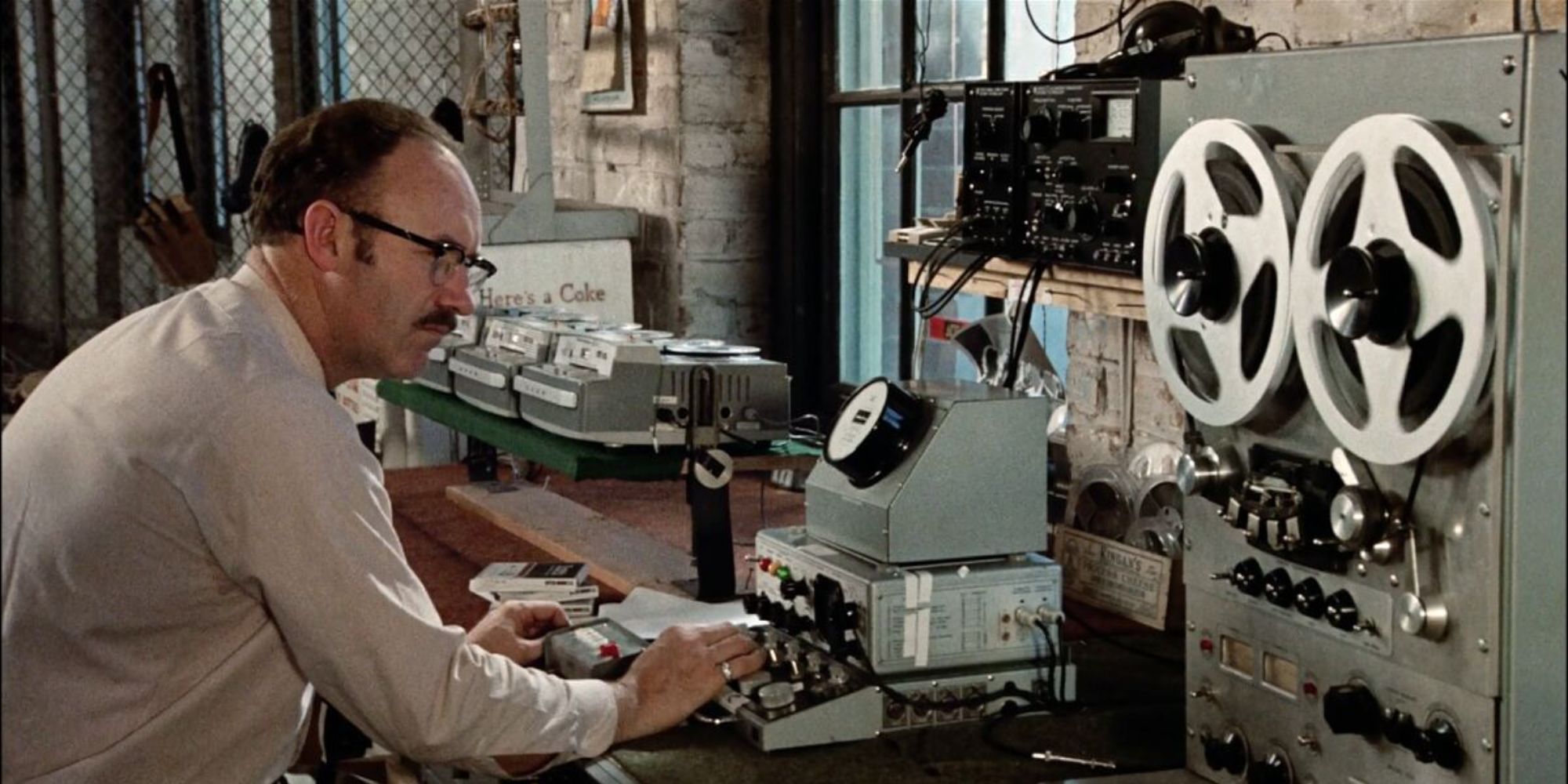 Actor Gene Hackman as Henry Caul watching over surveillance equipment in Francis Ford Coppola's movie, The Conversation 