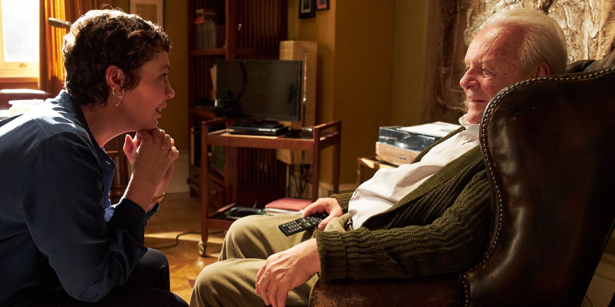 Olivia Colman and Anthony Hopkins as Anne and Anthony talk in a living room in The Father’ (2020)