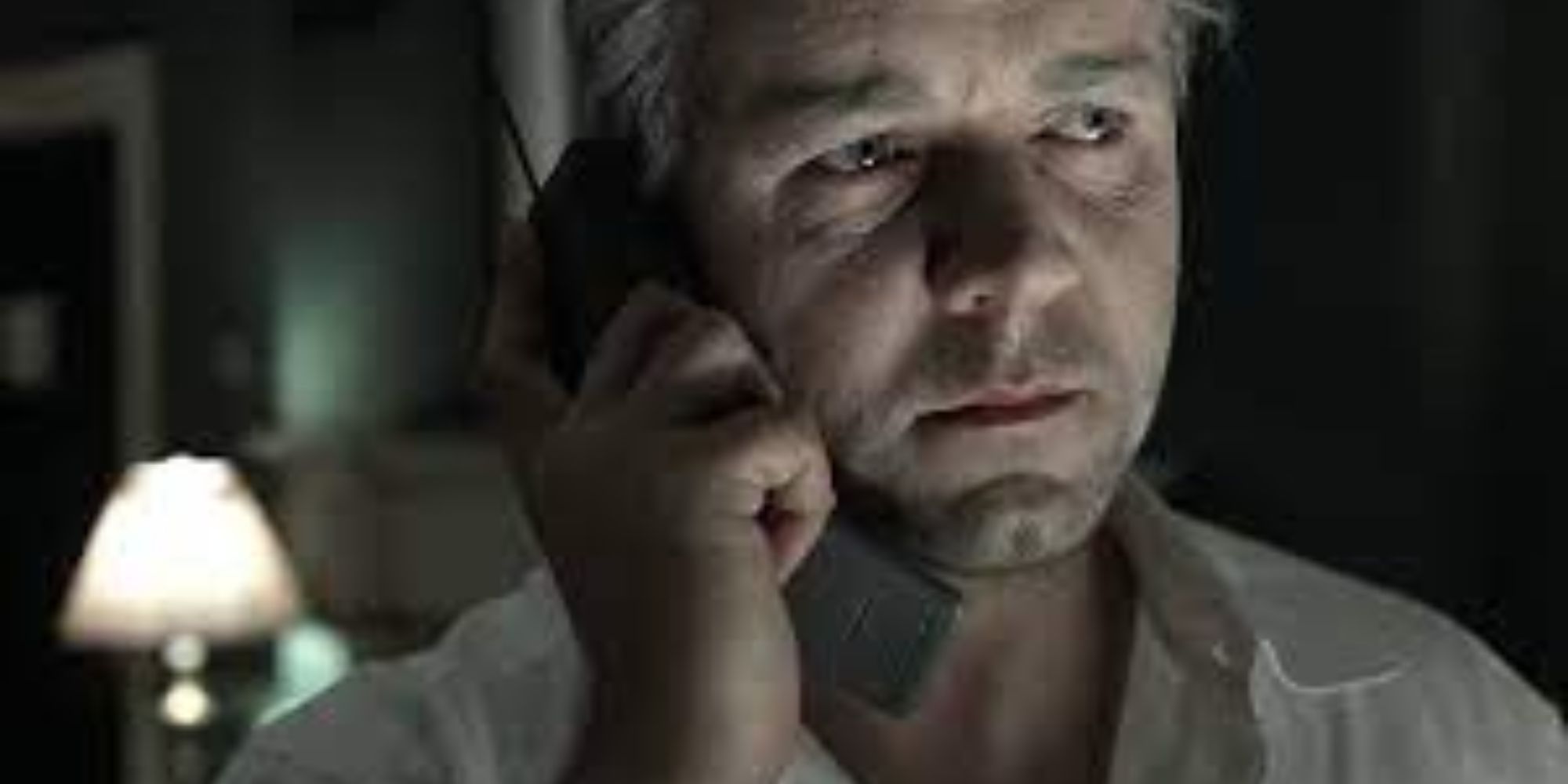 Jeffrey Wigand on the phone looking grim in 'The Insider' (1999)