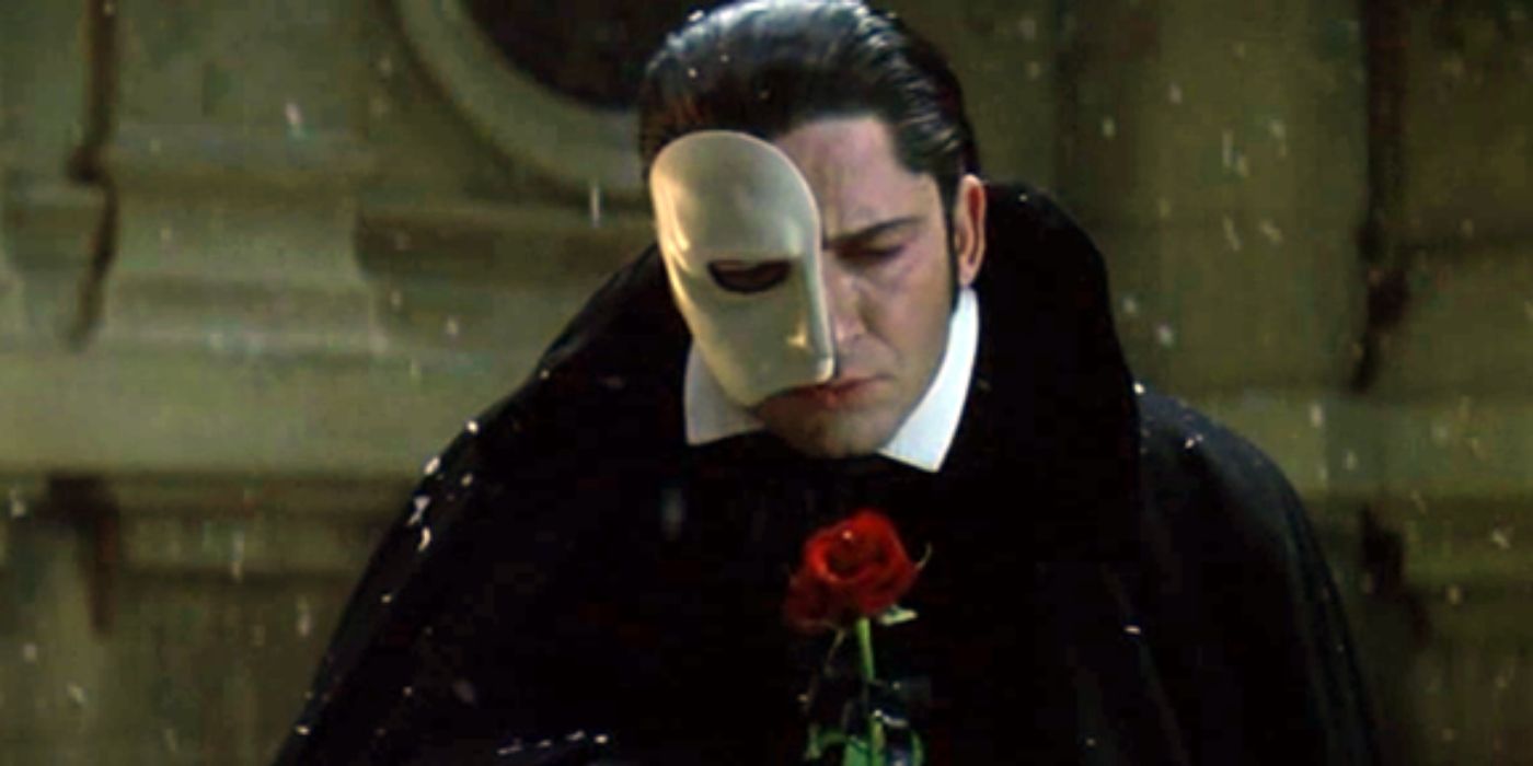 Gerard Butler as the Phantom, holding a rose, in 2004's 'Phantom of the Opera.' 
