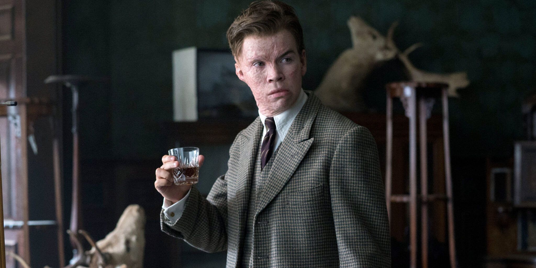 Rodrick Ayres, played by Will Poulter, holding a glass of alcohol