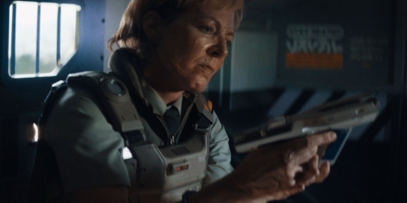 Allison Janney loading a gun in The Creator 