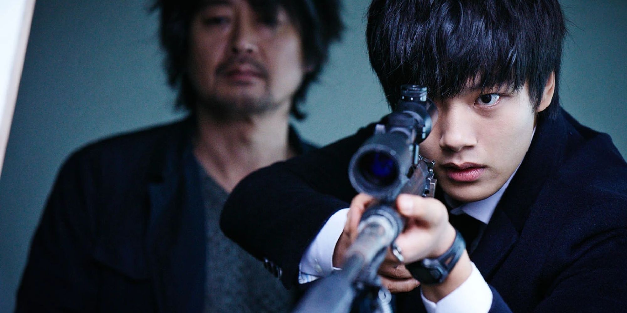 Yeo Jin-goo holding a gun in Hwa-Yi A Monster Boy