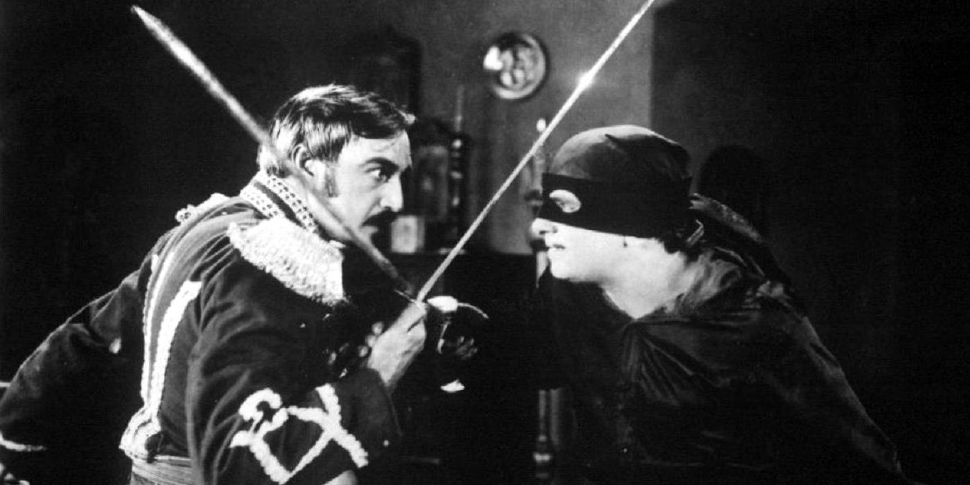 Zorro (Douglas Fairbanks) face to face with Captain Juan Ramon (Robert McKim) in the 1920 silent film The Mark of Zorro