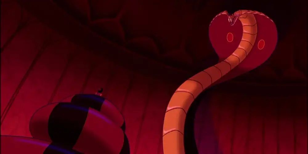 Jafar, en su forma de cobra, se prepara para matar a Aladdin