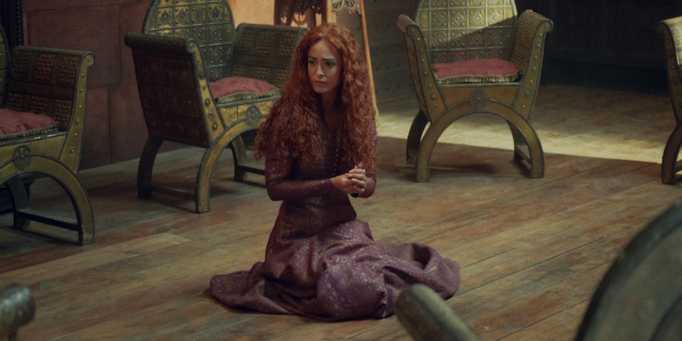 Anna Shaffer as Triss Merigold kneeling on the floor in The Witcher