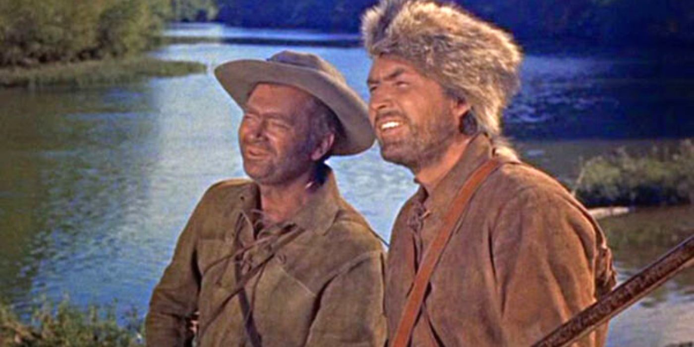 Buddy Ebsen and Fess Parker standing by a river in Davy Crockett