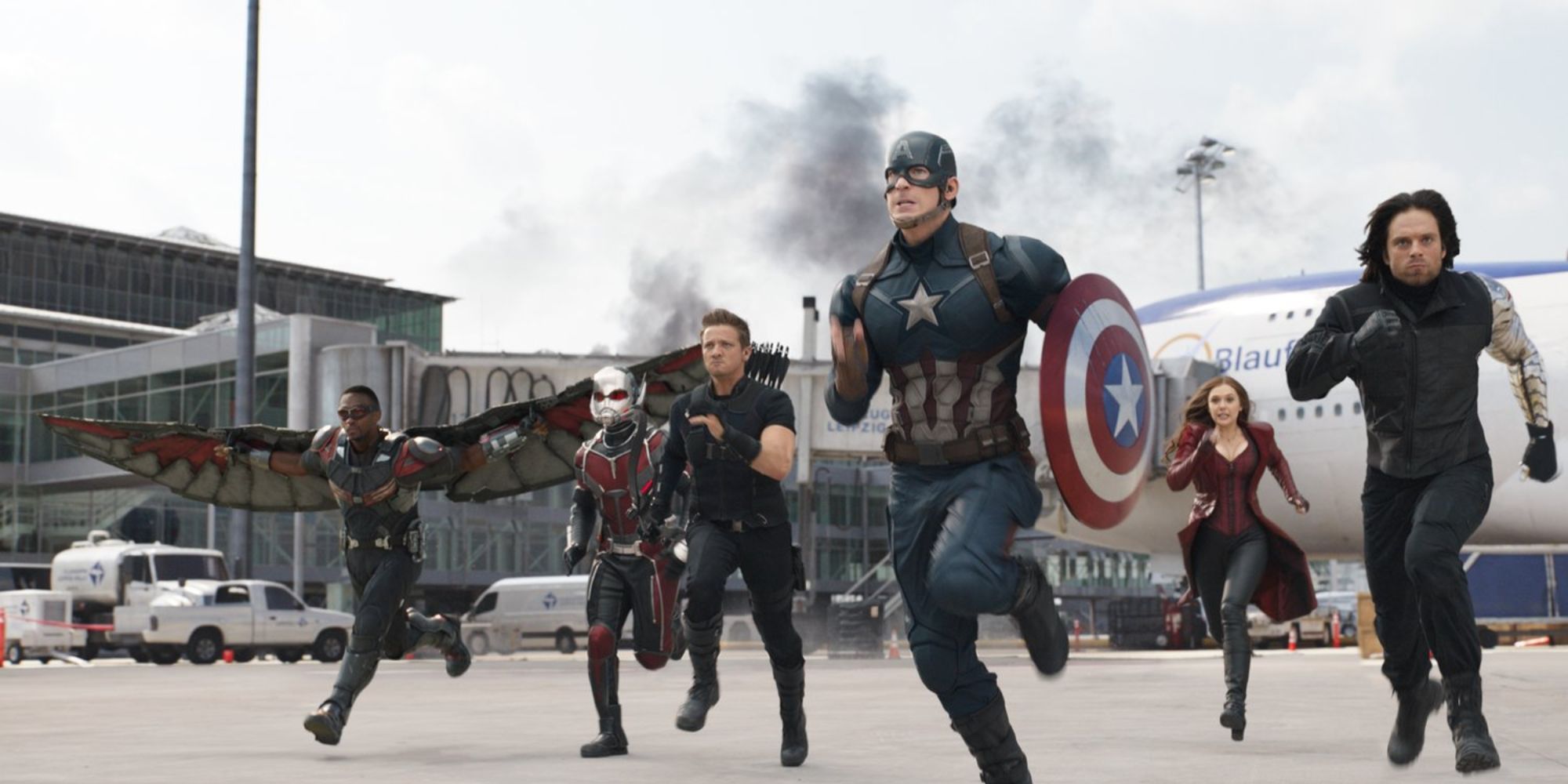 Captain America (Chris Evans) and his team run into battle in 'Captain America: Civil War'.