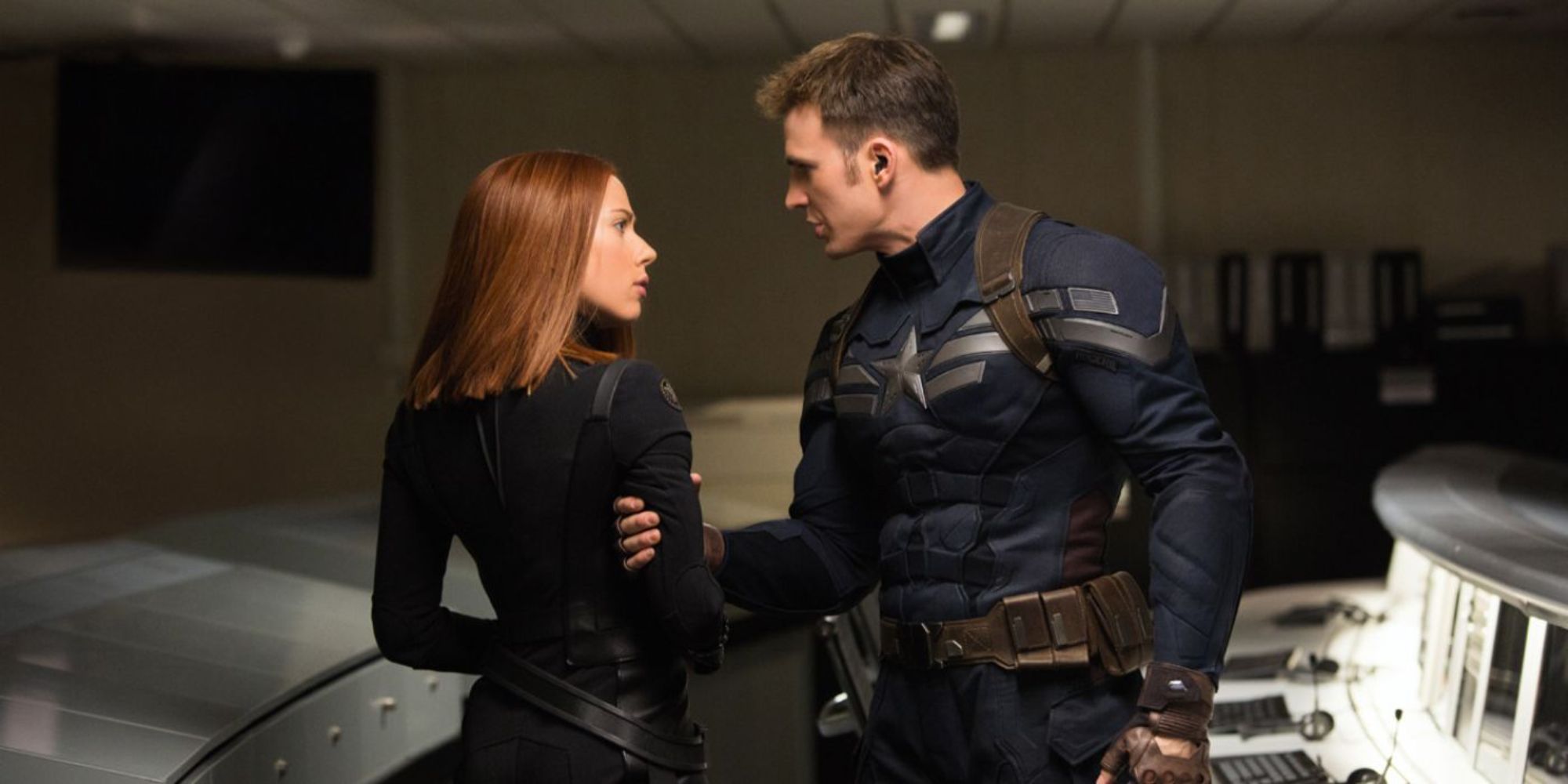 Captain America holding Black Widow by the arm in Captain America: The Winter Soldier