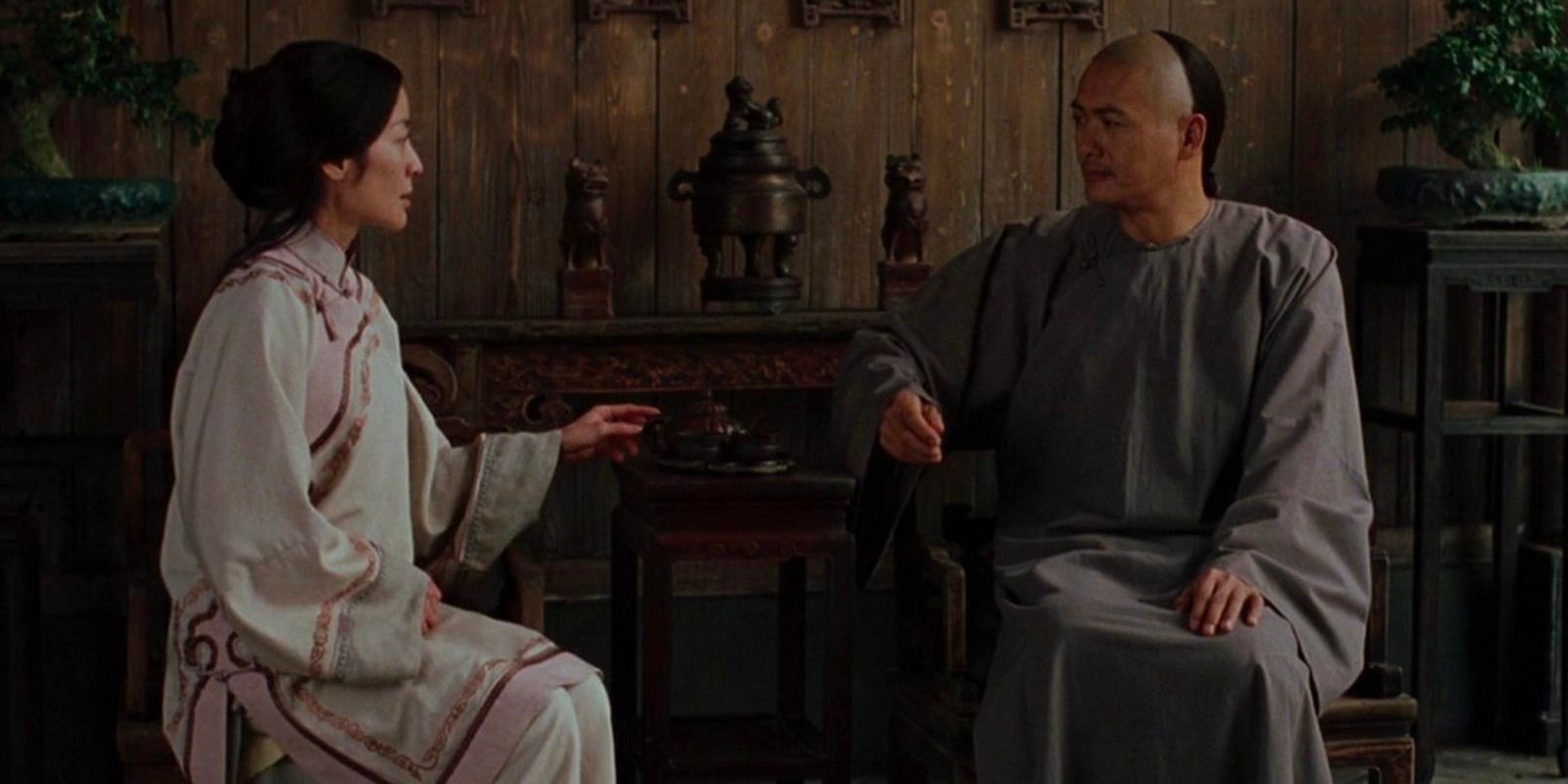 Two great Chinese warriors and close friends sit together in 'Crouching Tiger, Hidden Dragon'.