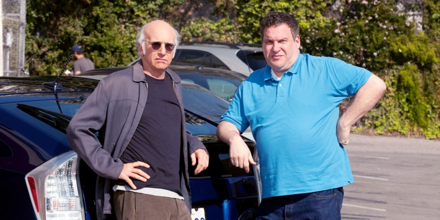 Larry and Jeff stand at a car in the Palestine Chicken Episode of Curb Your Enthusiasm