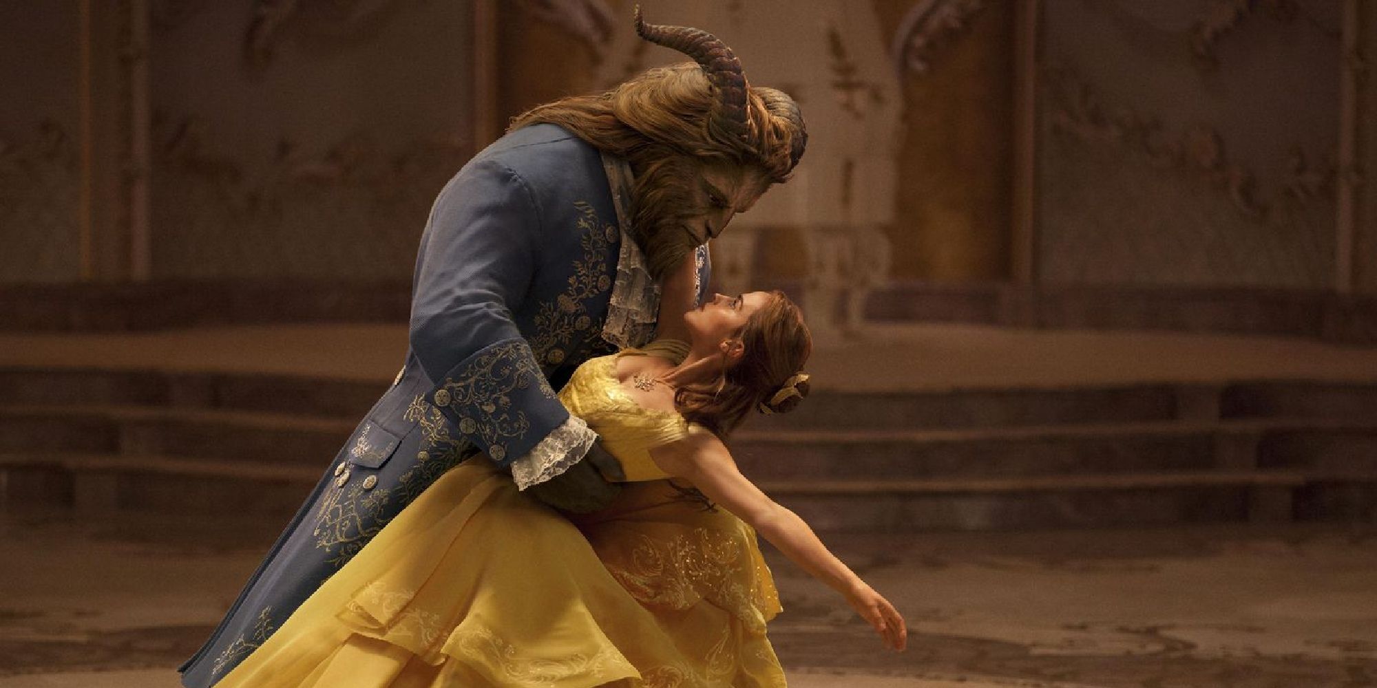 Dan Stevens as Beast and Emma Watson as Belle dancing in Beauty and the Beast.