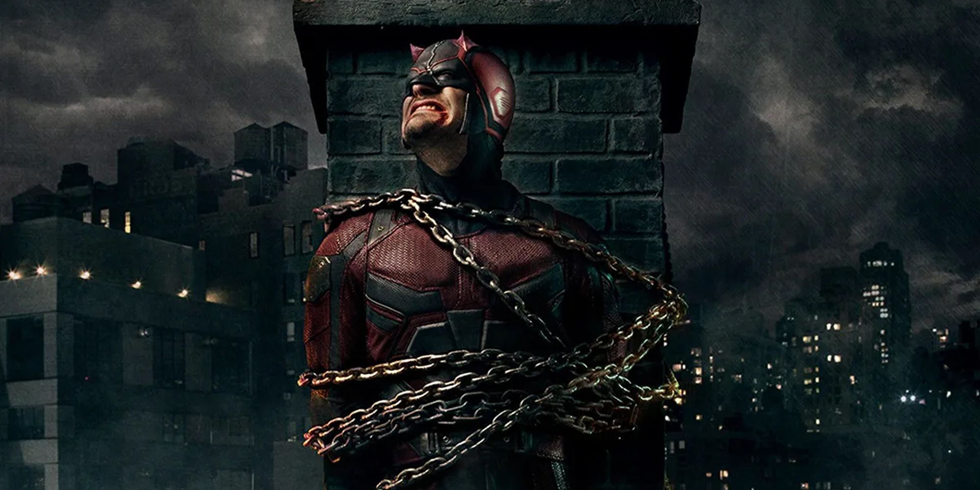 Daredevil tied up to a brick chimney with metal chains on the poster for Season 2 of Netflix's Daredevil