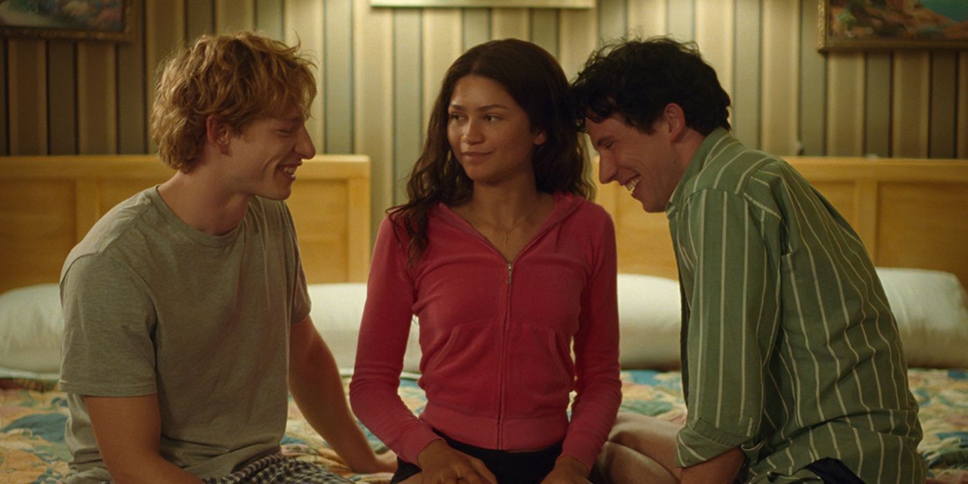 Mike Faist, Zendaya, and Josh Connor on a bed together as Art, Tashi, and Patrick in Challengers