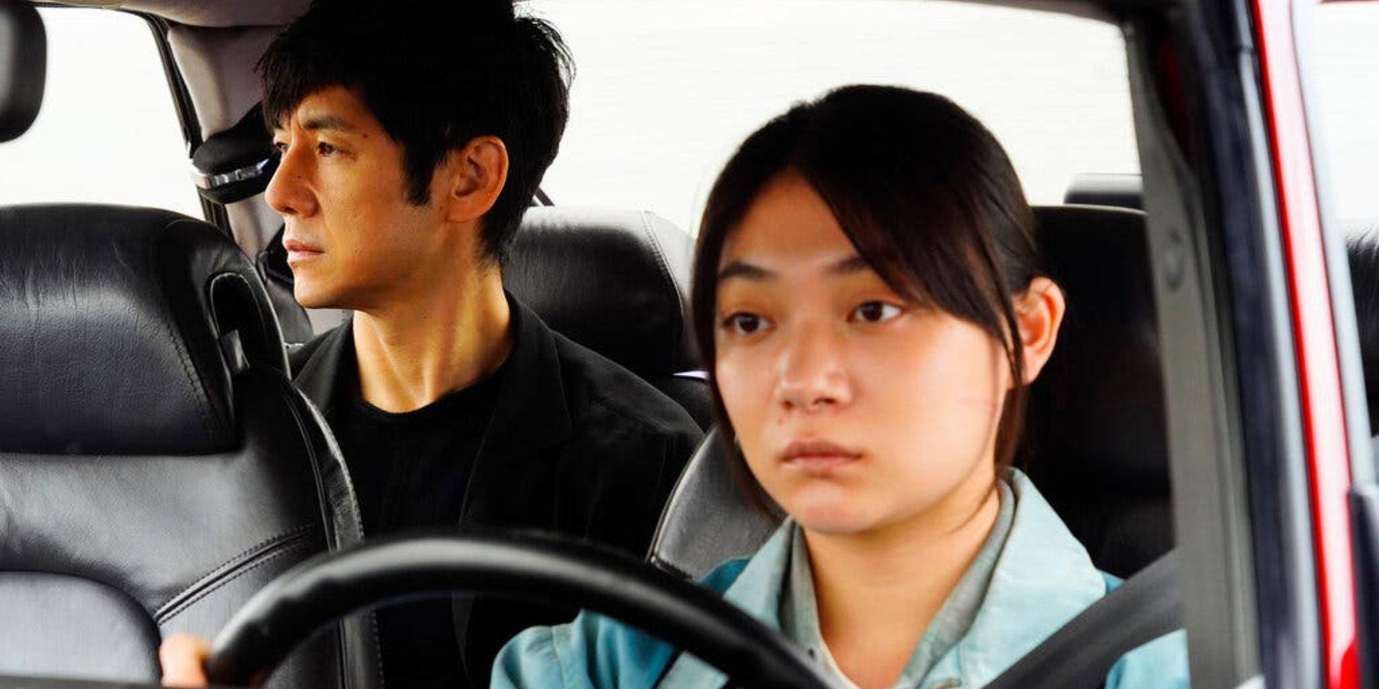 Yūsuke Kafuku in the backseat of a car driven by Misaki Watari