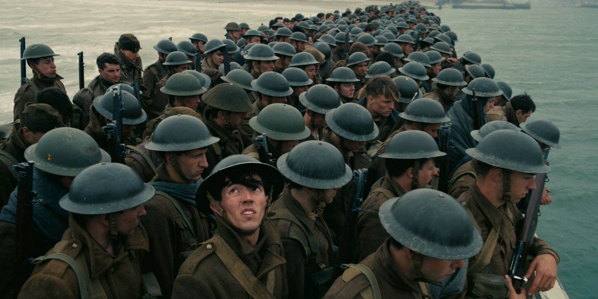 A group of soldiers wearing helmets in Dunkirk 