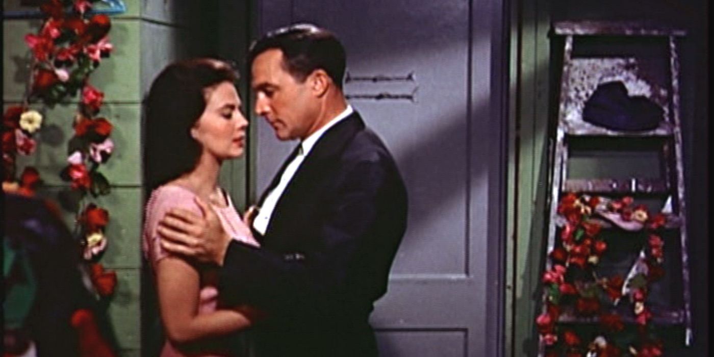 Gene Kelly and Natalie Wood hug each other in 
