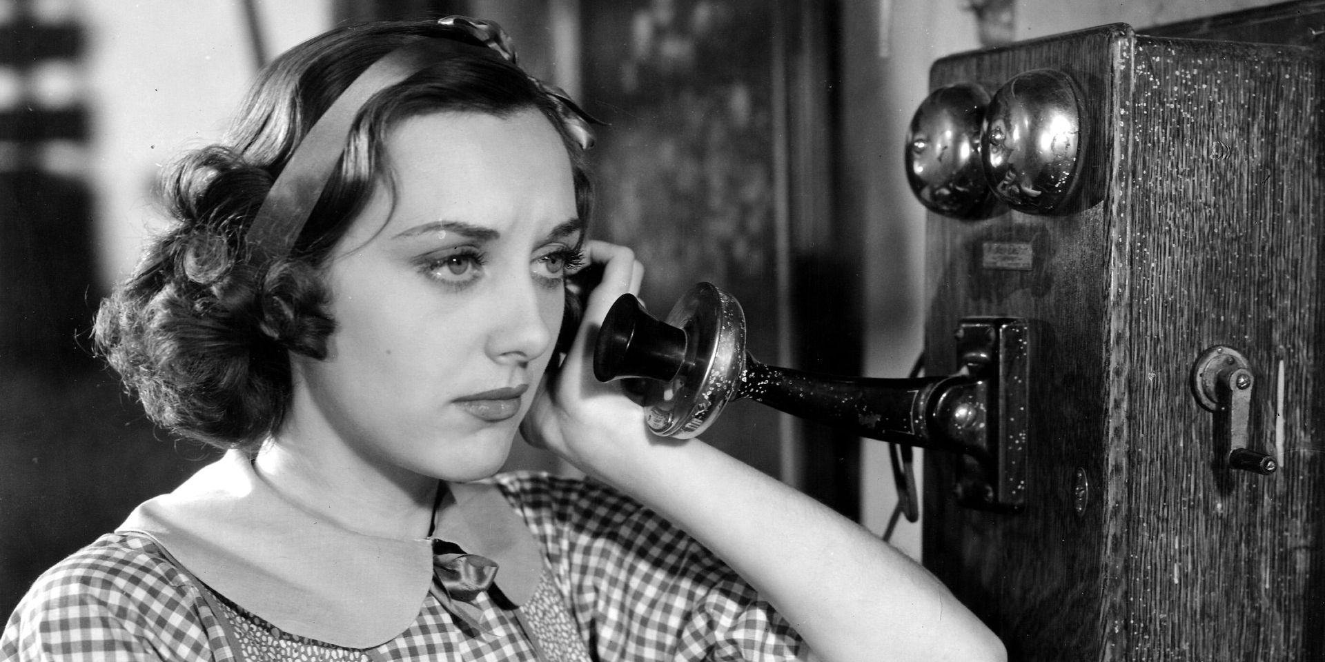 Ann Dvorak looks disappointed as she speaks to someone on the telephone in Heat Lightning.
