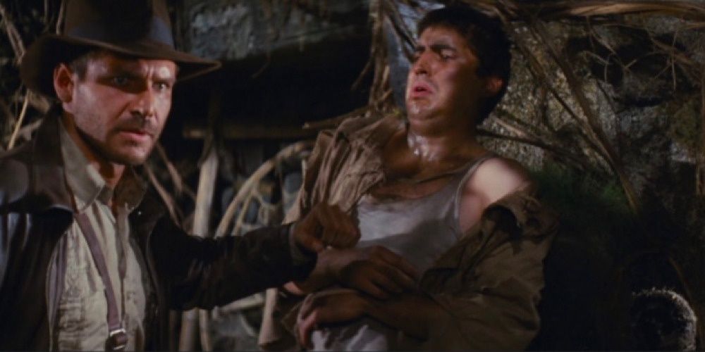 Harrison Ford and Alfred Molina in Raiders of the Lost Ark. 