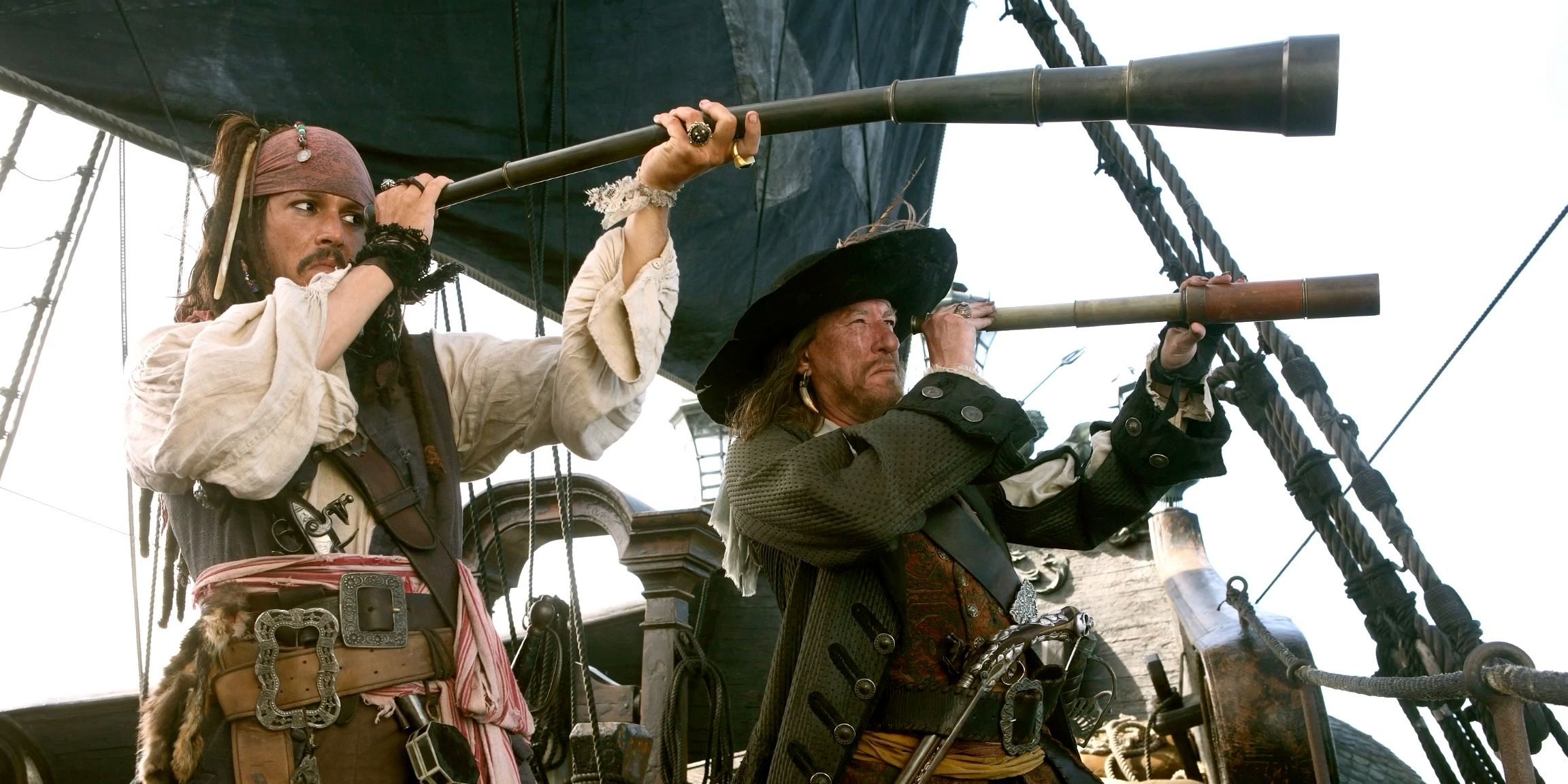 Johnny Depp and Geoffrey Rush in Pirates of the Caribbean.