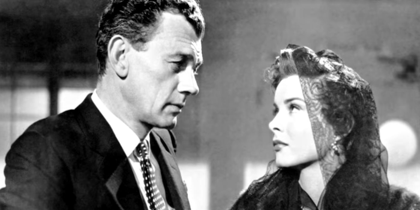 Joseph Cotten and Jean Peters looking at each other in A Blueprint for Murder (1953)