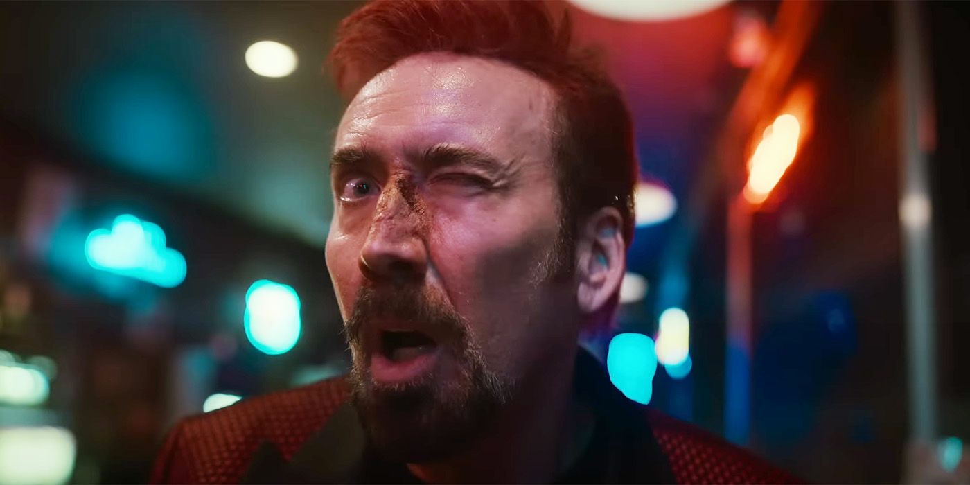 Nicolas Cage as The Passenger winking in Sympathy for the Devil
