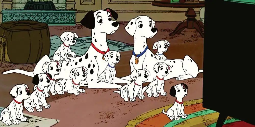 Pongo, Perdita, and ten of their fifteen puppies watching television