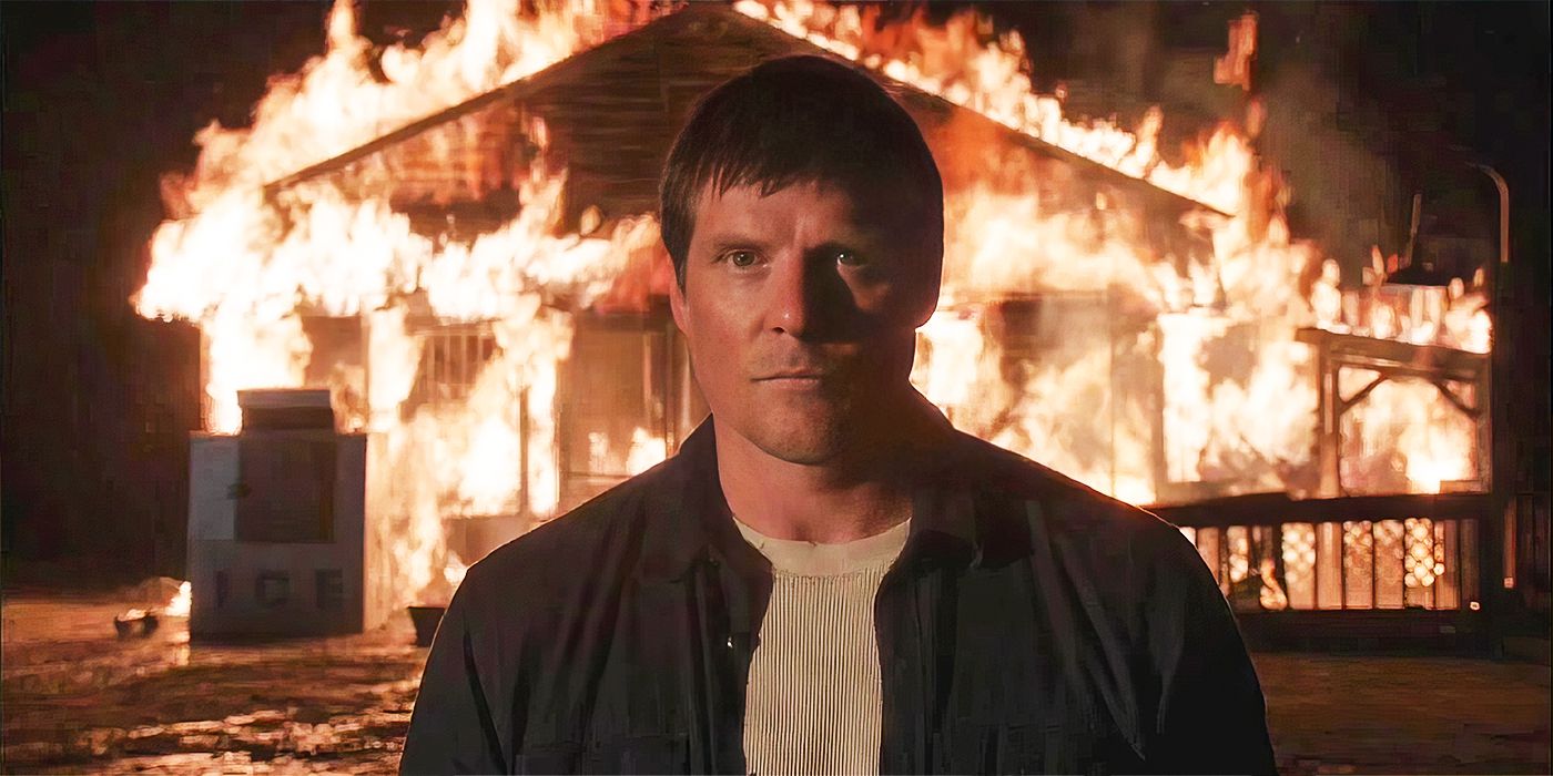 Actor Paul Johansson as Dan Scott, standing solemnly in front of his burning diner in Season 9 of One Tree Hill