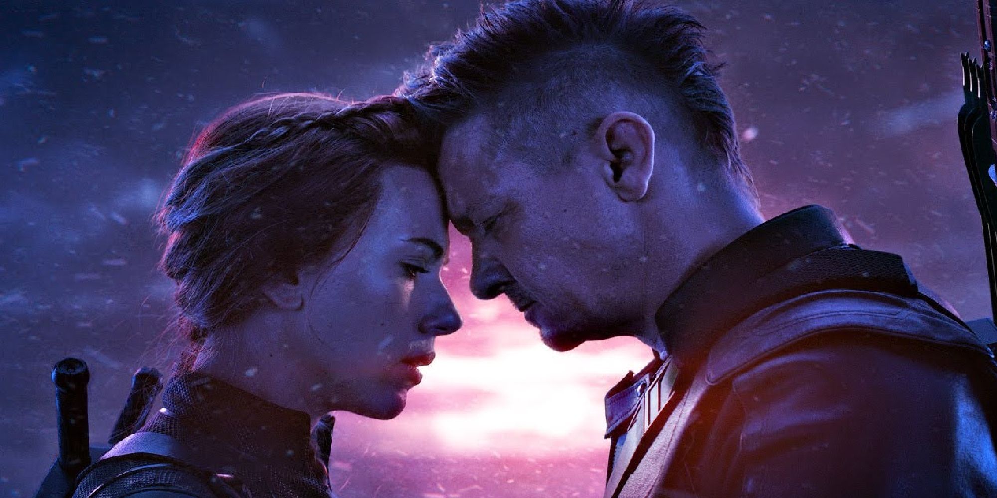 Scarlett Johansson and Jeremy Renner leaning their foreheads against each other in Avengers: Endgame